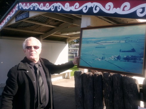 Noel Hair with a photo of the view from an earlier Bell Rd property
